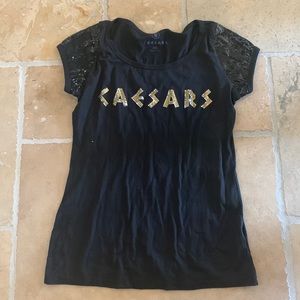 A cute black top in the brand Caesar’s